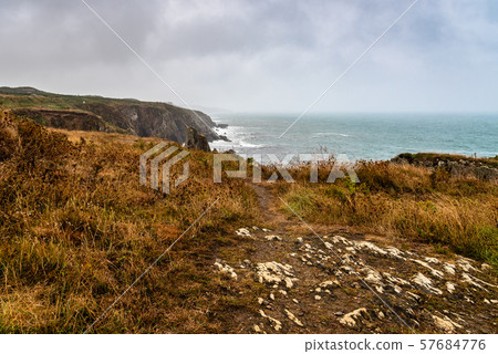 Scenic view of cliffs and sea against sky Scenic view of cliffs and sea against sky 57684776