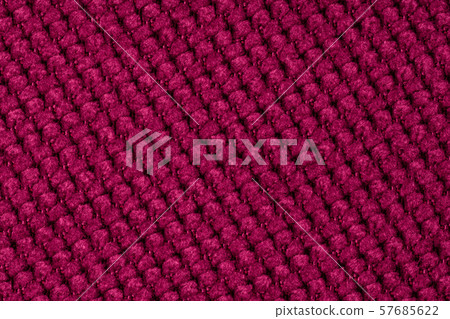 Dark red background from a textile material. 57685622