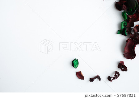 Flowers composition. Frame made of dried rose flowers on white background 57687821
