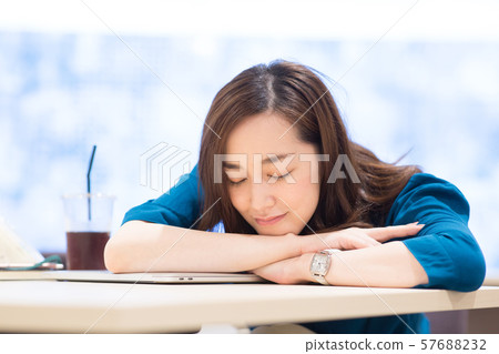 Sleepy business woman 57688232