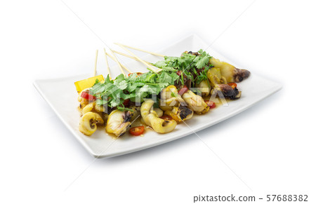 Squid Grilled with bamboo sticks inside dish Squid Grilled with bamboo sticks inside dish 57688382