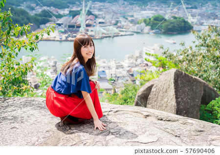 Young woman sightseeing onomichi 57690406