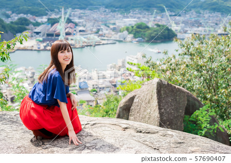 Young woman sightseeing onomichi Young woman sightseeing onomichi 57690407