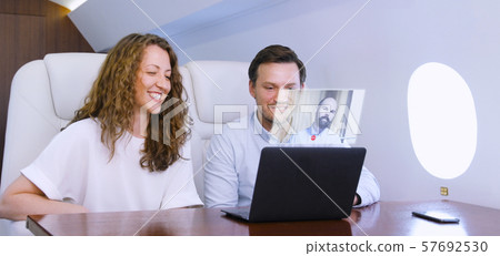 Making video call on private plane 57692530