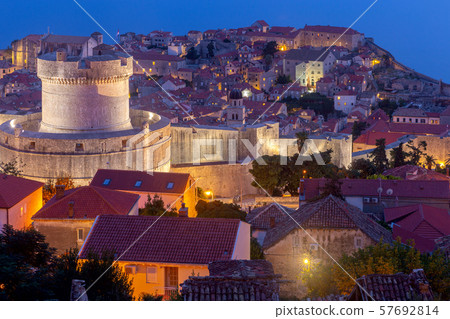 Aerial view of Dubrovnik and the Minchet Tower at sunset. 57692814