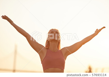 Young woman enjoying the nature 57693114