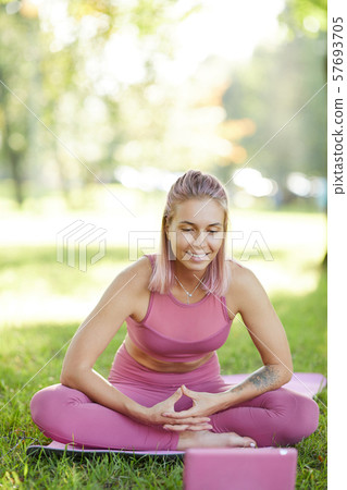 Woman holding online training Woman holding online training 57693705
