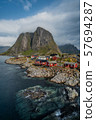 View of Hamnoy or Hamnoya, a small fishing village in Moskenes Municipality on Lofoten islands in Nordland county, Norway from the photo spot on the bridge nearby 57694287