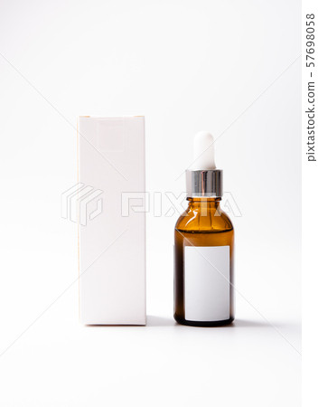 Brown glass cosmetic bottle mock-up with blank white label 57698058