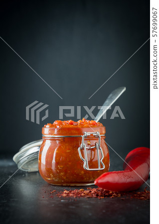 Traditional bell pepper paste harissa. 57699067