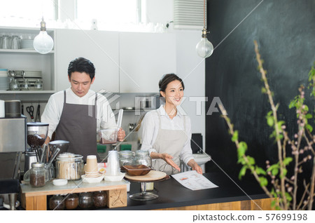 Cafe staff men and women Cafe staff men and women 57699198