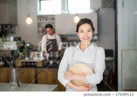 Cafe staff men and women Cafe staff men and women 57699512