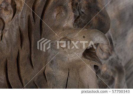 Beautiful texture of old carved stained oak. 57700343
