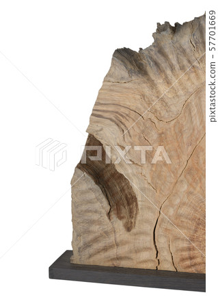 Carved sculpture of bog oak on a white background. Carved sculpture of bog oak on a white background. 57701669