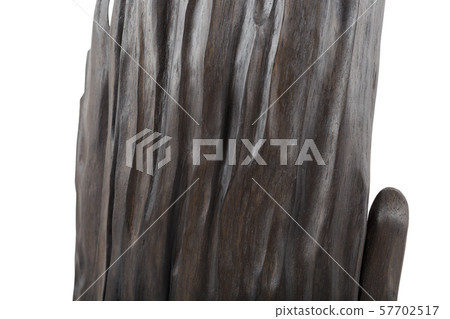 Carved sculpture of bog oak on a white background. 57702517