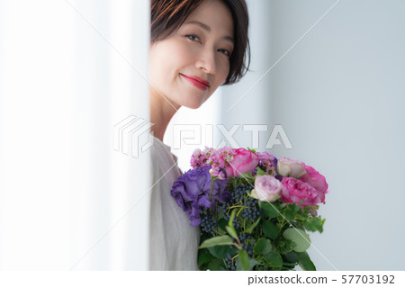 1 person fashion bouquet beauty lifestyle woman woman interior design room white natural light 57703192