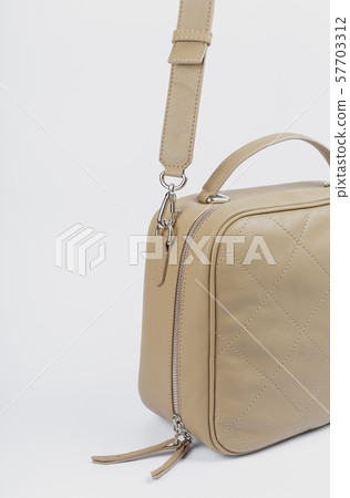 New women bag on a white background, new design. New women bag on a white background, new design. 57703312