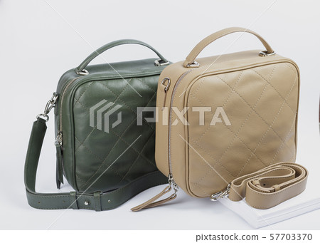 Two stylish women bags on a white background. 57703370