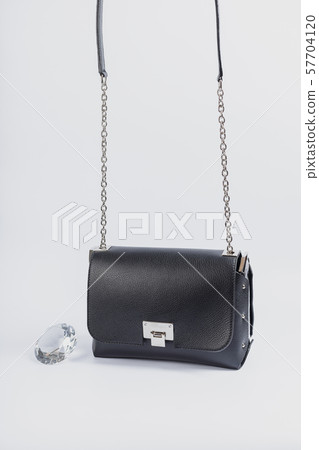 Black women bag on a white background. Black women bag on a white background. 57704120