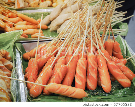 Fried sausage sticks and various meatballs sticks 57705588