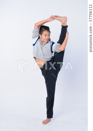 Full body shot of beautiful Asian woman stretching and ready for gym 57706112