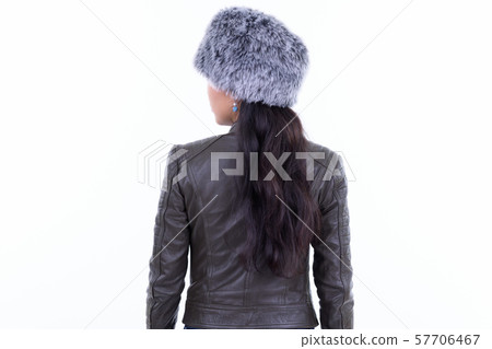 Rear view of Asian woman ready for winter Rear view of Asian woman ready for winter 57706467