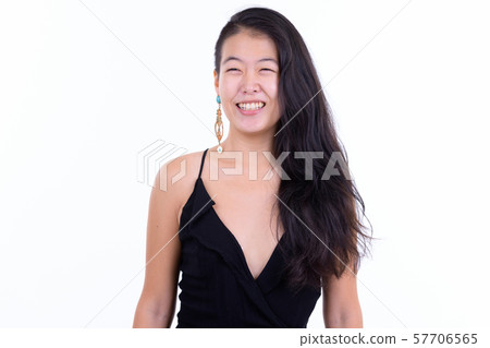 Portrait of happy beautiful Asian woman thinking ready to party 57706565