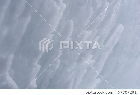 Snow wall close-up. White clean snow surface. Snow wall close-up. White clean snow surface. 57707291