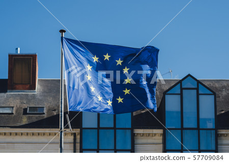 EU flag fluttering in the wind (with background) EU flag fluttering in the wind (with background) 57709084