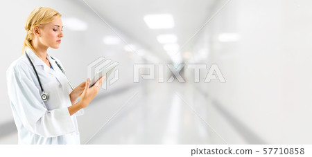 Doctor using tablet computer at the hospital. 57710858