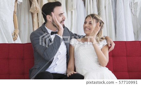Bride and groom in wedding dress prepare ceremony. Bride and groom in wedding dress prepare ceremony. 57710991