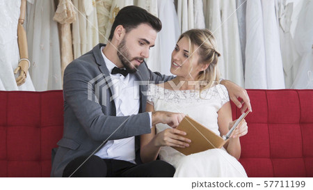 Bride and groom in wedding dress prepare ceremony. Bride and groom in wedding dress prepare ceremony. 57711199