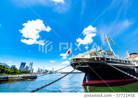 Hikawa Maru and Minato Mirai distant view moored at the Yamashita Park Pier in Yokohama 57711458