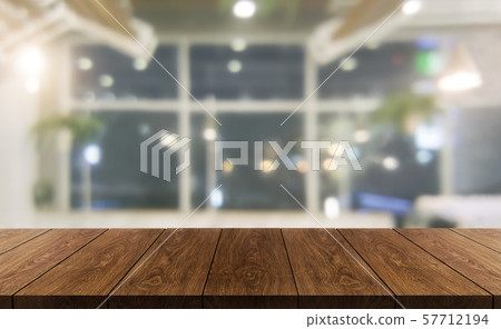 Wood table in blur background of modern restaurant Wood table in blur background of modern restaurant 57712194