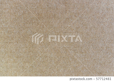 Brown background from sheet of recycled cardboard. Close up detail view of abstract texture 57712481