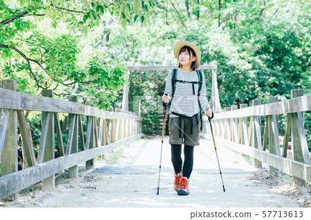 Trekking young woman 57713613