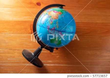Plastic globes on wooden floors. Plastic globes on wooden floors. 57713657