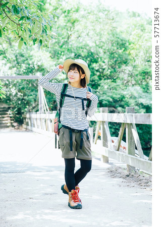 Trekking young woman 57713674