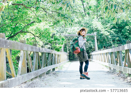 Trekking young woman 57713685