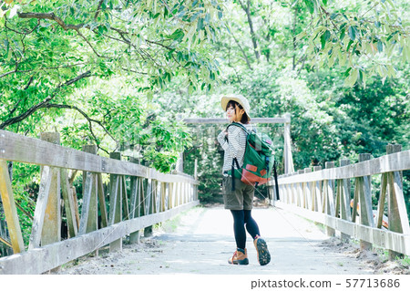 Trekking young woman 57713686