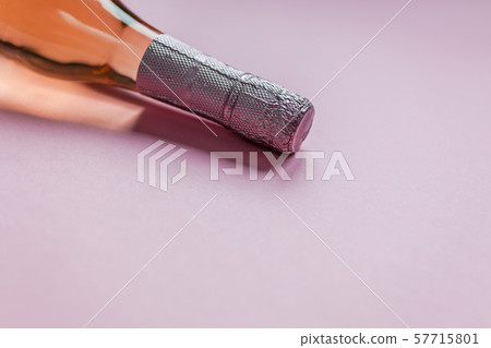 Bottle of rose champagne wine on pink background 57715801