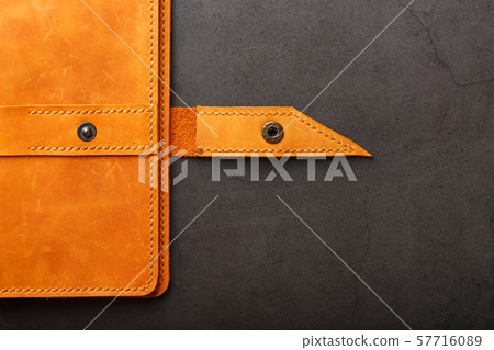 Wallet made of genuine brown nubuck leather on a 57716089