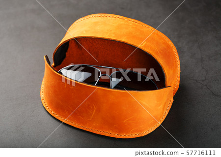 Brown case wallet for glasses made of genuine 57716111