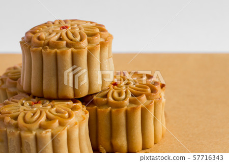 Moon cake on white and brown background 57716343