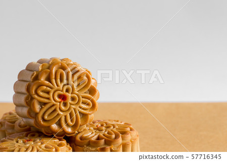 Moon cake on white and brown background Moon cake on white and brown background 57716345