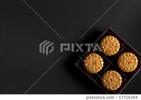 Moon cake on black background Moon cake on black background 57716364