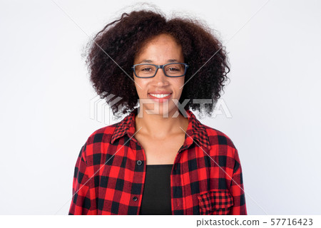 Face of happy young African hipster woman with eyeglasses smiling Face of happy young African hipster woman with eyeglasses smiling 57716423