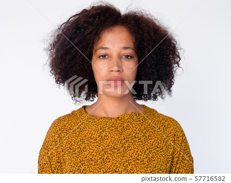 Face of young beautiful African woman looking at camera 57716582
