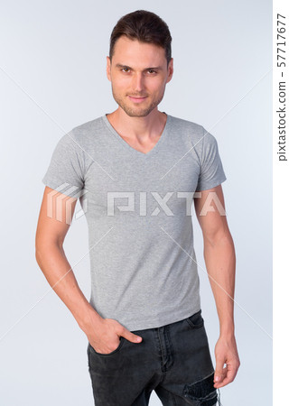 Studio shot of handsome man with casual clothing 57717677