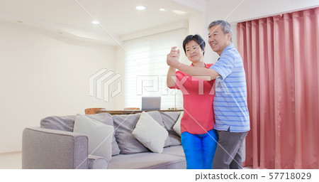 asian eldely couple dance together asian eldely couple dance together 57718029